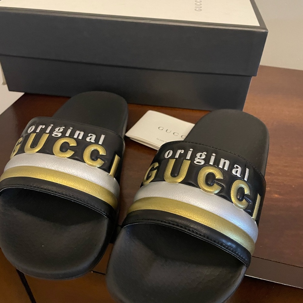 Gucci Black and Gold Slides